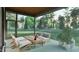 Outdoor patio with comfortable seating, peaceful view and ample area for entertaining and relaxing at 3908 Cedar Knolls Dr, Youngsville, NC 27596