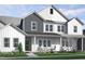 Charming two-story home with Hardie board siding, covered porch, and manicured front lawn at 3922 Willow Gate Way, Raleigh, NC 27604