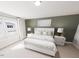Serene main bedroom with natural light, soft carpet, and neutral decor at 3922 Willow Gate Way, Raleigh, NC 27604