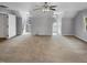 Bedroom with a ceiling fan, carpet, and natural light from two windows at 4216 High Mountain Dr, Raleigh, NC 27603