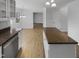 Modern Kitchen features lots of white cabinets and views to the breakfast room at 4216 High Mountain Dr, Raleigh, NC 27603