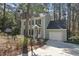 Inviting two-story home with attached garage and manicured landscaping at 4815 Fortunes Ridge Dr, Durham, NC 27713