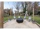 Outdoor space features a cozy fire pit area with comfortable seating, perfect for relaxation and gatherings at 4900 Skidmore St, Raleigh, NC 27609