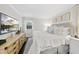 Inviting bedroom features a comfortable bed, stylish furnishings, and an abundance of natural light at 4900 Skidmore St, Raleigh, NC 27609