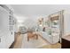 Bright living room with neutral furniture, complemented by hardwood floors and natural light at 4900 Skidmore St, Raleigh, NC 27609