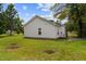A spacious backyard with a shed and green grass at 501 E Granville St, Dunn, NC 28334