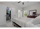 The bedroom features a ceiling fan, walk-in closet, ensuite bathroom, and a window at 501 E Granville St, Dunn, NC 28334