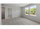 Bedroom featuring neutral carpet and multiple windows at 55 Cordoba Dr, Franklinton, NC 27525