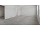 Comfortable bedroom with neutral carpet and a door leading to a walk-in closet at 55 Cordoba Dr, Franklinton, NC 27525