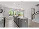 Stylish kitchen with stainless appliances, a central island, and bright, open layout at 55 Cordoba Dr, Franklinton, NC 27525