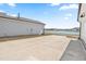 Backyard featuring a concrete patio with view of a pond behind the home at 5800 Agrinio Way, Raleigh, NC 27603