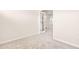 Neutral bedroom featuring french door entry and closet door to the hall at 5800 Agrinio Way, Raleigh, NC 27603