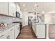 Well-equipped kitchen with stainless steel appliances, granite counters, and ample cabinet space at 5800 Agrinio Way, Raleigh, NC 27603