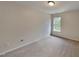 Neutral bedroom with carpet, one window and blank walls at 613 Ashburn Ln, Durham, NC 27703