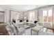 Bright living room showcasing modern furnishings, large windows, hardwood floors, and stylish decor at 620 Wade Ave # 506, Raleigh, NC 27605