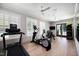 Bright workout room with treadmills, elliptical machine, weights, and fitness equipment at 620 Wade Ave # 506, Raleigh, NC 27605