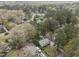Aerial view of the neighborhood with lush greenery and well-maintained homes at 6216 Lewisand Cir, Raleigh, NC 27615