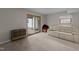 Finished basement with sliding glass door leading to patio at 6216 Lewisand Cir, Raleigh, NC 27615