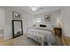 Cozy bedroom featuring a queen bed, stylish decor, and a comfortable atmosphere at 6216 Lewisand Cir, Raleigh, NC 27615