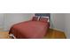 Comfortable bedroom with neutral walls and bright natural light at 6216 Lewisand Cir, Raleigh, NC 27615