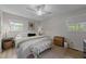 Comfortable bedroom with a large bed, bright windows, and stylish decor provides a relaxing retreat at 6216 Lewisand Cir, Raleigh, NC 27615