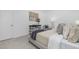 Cozy bedroom with soft lighting, neutral linens, and modern decor creates a relaxing and comfortable space at 63 Mable Court # 6, Lillington, NC 27546