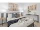 Inviting bedroom with natural light, modern decor, and a comfortable bed creates a serene and relaxing retreat at 63 Mable Court # 6, Lillington, NC 27546
