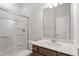Bathroom featuring double sink vanity with ample counter space and a framed mirror at 65 Cordoba Dr, Franklinton, NC 27525