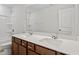 Bathroom featuring double sink vanity with ample counter space and a framed mirror at 65 Cordoba Dr, Franklinton, NC 27525