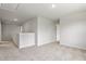 Open loft area with neutral walls and plush carpeting, perfect for relaxation or entertainment at 65 Cordoba Dr, Franklinton, NC 27525