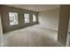 Bonus room area featuring natural light from three windows at 76 Commons Cir, Clayton, NC 27520