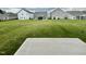 Expansive backyard with a patio, ideal for outdoor living and entertaining at 76 Commons Cir, Clayton, NC 27520