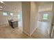 Open-concept kitchen with an island and stainless steel sink at 76 Commons Cir, Clayton, NC 27520