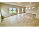 Spacious living room with hardwood floors and plenty of natural light at 76 Commons Cir, Clayton, NC 27520