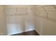 Spacious walk-in closet with shelving at 76 Commons Cir, Clayton, NC 27520