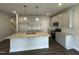 Modern kitchen with granite countertops, stainless steel appliances, and ample cabinet space at 765 Portland Rose Dr, Knightdale, NC 27545