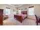 Main bedroom with tray ceilings and large windows for lots of natural light at 79 Hillgrove Dr, Willow Springs, NC 27592