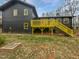 Backyard of home with a deck and grass at 8125 Park Side Dr, Raleigh, NC 27612