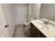 Bathroom with modern vanity, tile flooring, and a shower-tub combination at 84 Commons Cir, Clayton, NC 27520