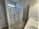 Bathroom with shower and dual sink vanity at 84 Commons Cir, Clayton, NC 27520