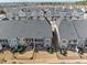 An aerial view highlights the design of townhome backyards, providing privacy and outdoor living at 8410 Zinc Autumn Path, Raleigh, NC 27615