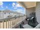 Relaxing back porch overlooking the neighborhood with comfortable seating and exterior finishes at 8410 Zinc Autumn Path, Raleigh, NC 27615
