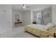 Inviting bedroom featuring soft carpet, a comfortable bed, and natural light from the window at 8410 Zinc Autumn Path, Raleigh, NC 27615