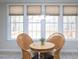 Bright breakfast nook featuring large windows and seating for two at 8417 Henderson Rd, Apex, NC 27539