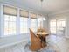 Charming breakfast nook with views of the outdoor deck and natural light at 8417 Henderson Rd, Apex, NC 27539