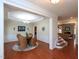 Formal dining room with decorative chandelier and natural light at 8417 Henderson Rd, Apex, NC 27539