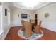 Cozy dining room with seating for four and traditional decor at 8417 Henderson Rd, Apex, NC 27539