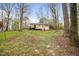 The expansive backyard offers plenty of space and privacy at 900 Cricket Knoll Rd, Fuquay Varina, NC 27526