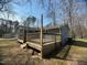 Large wooden deck with railing, offering a great space for outdoor relaxation and gatherings at , Durham, NC 27712