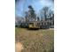 Inviting single-story home with a newly constructed deck and mature trees creating a serene setting at , Durham, NC 27712